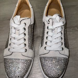 Beautiful Louboutin sneakers. Worn once. Too flat for me.